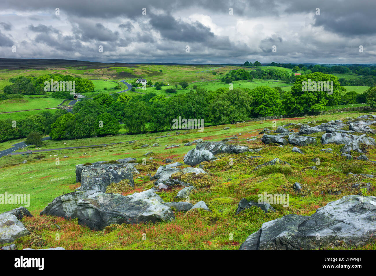 North York Moors on a bright summer morning showing rocks from the Jurassic and the undulating landscape. Stock Photo