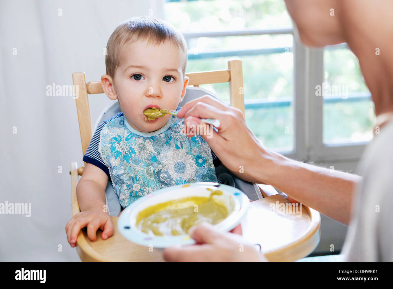CHILD EATING A MEAL Stock Photo