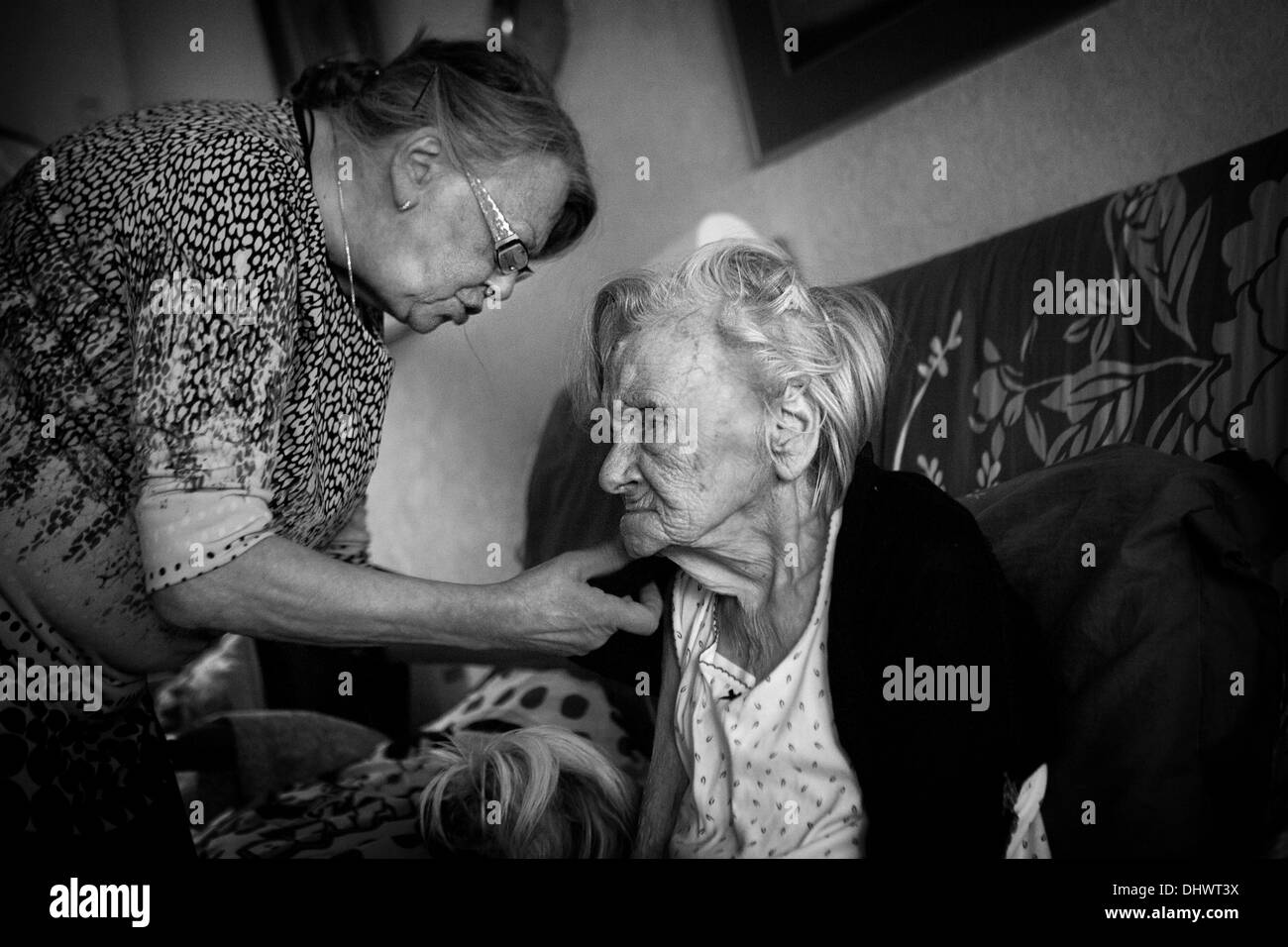 Caregiver helping old hi-res stock photography and images - Alamy