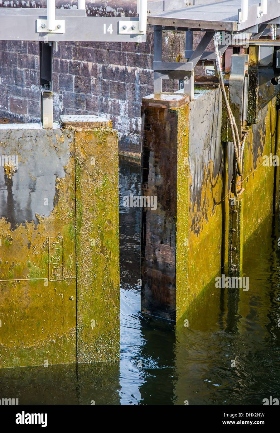 Narrow Gap In Opening Sluice Door Stock Photo