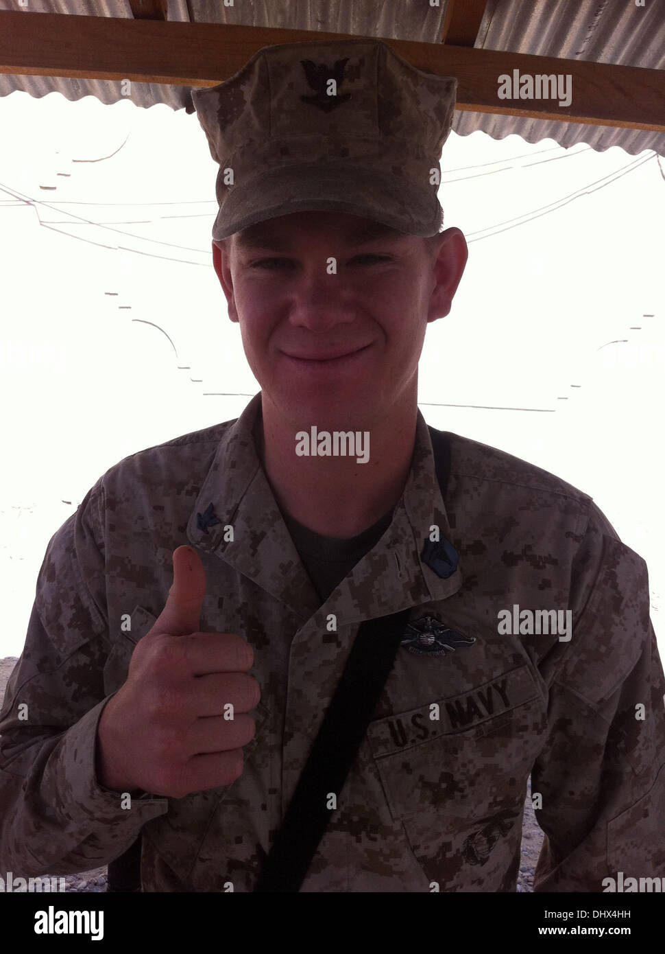 US MARINE RESCUES FOUR ORPHAN RABBITS A U.S. Marine Corps unit worker