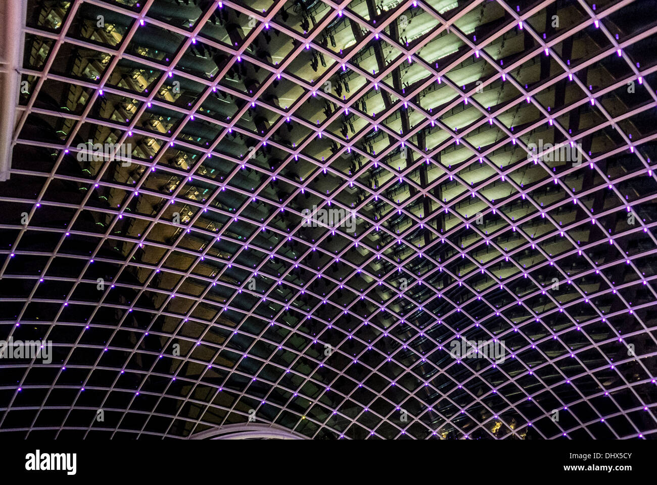 Domed roof structure at Leeds Trinity Shopping Centre, seen from inside at night. Leeds, UK. Stock Photo