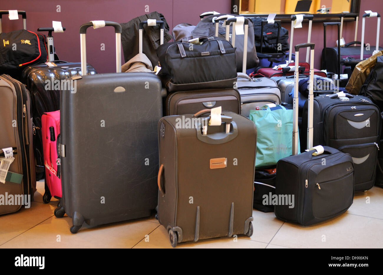 Suitcases waiting collection Stock Photo