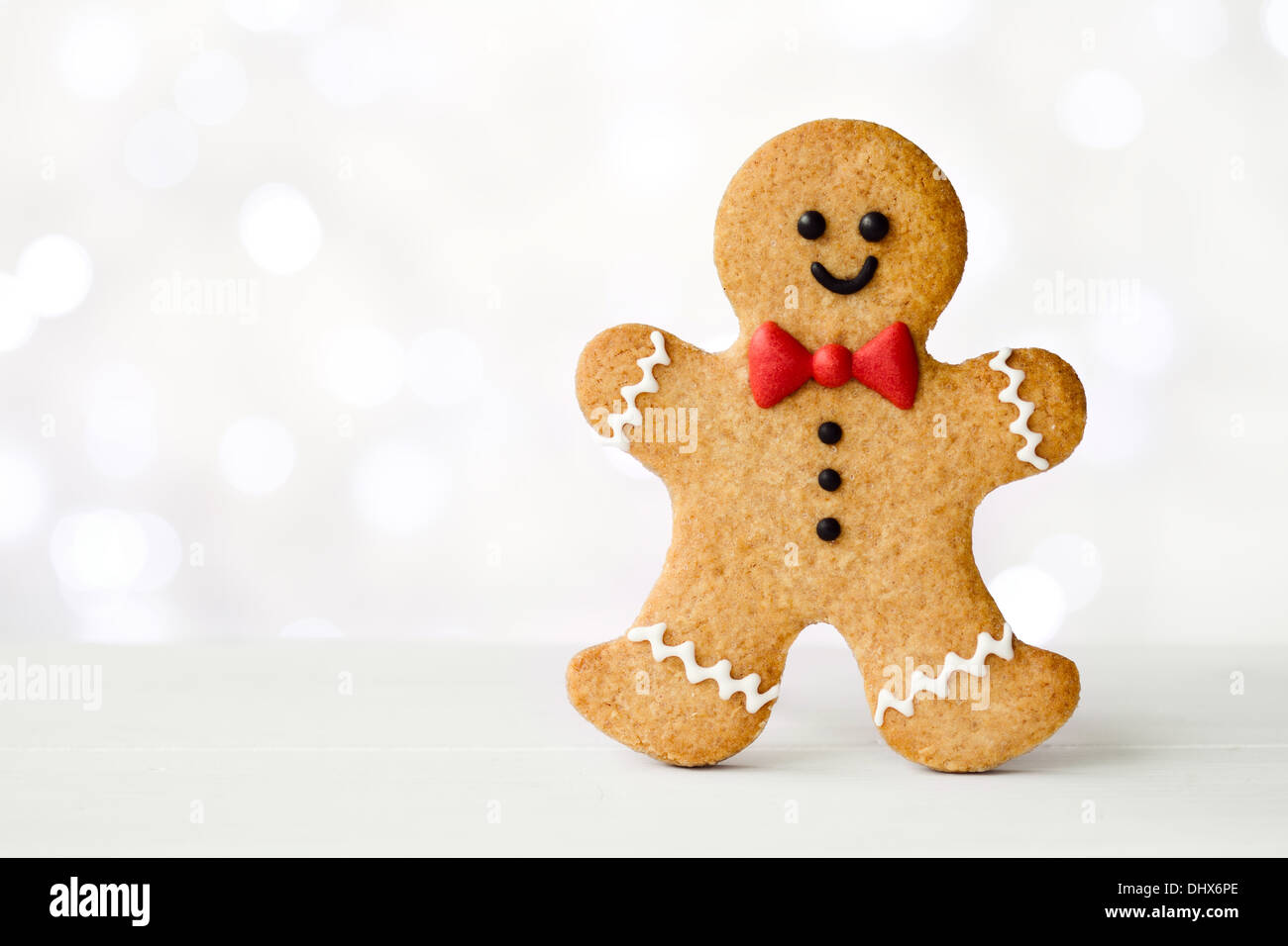 Dark Brown Gingerbread Man with Red Bow Tie Felt Ornament