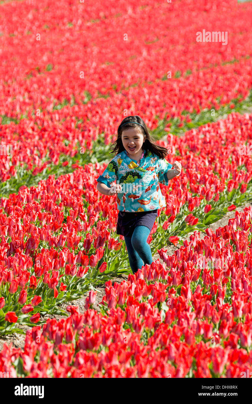 Child and field of flowers hi-res stock photography and images - Alamy