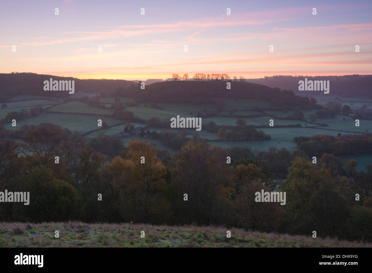 Downham Hill ridge viewed from Peaked Down in an early morning autumn sunrise Stock Photo