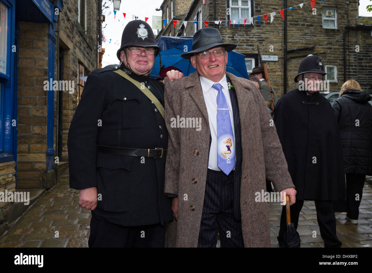 A Police officer apprehends a spiv at Haworth 1940s weekend, May 2013. Stock Photo
