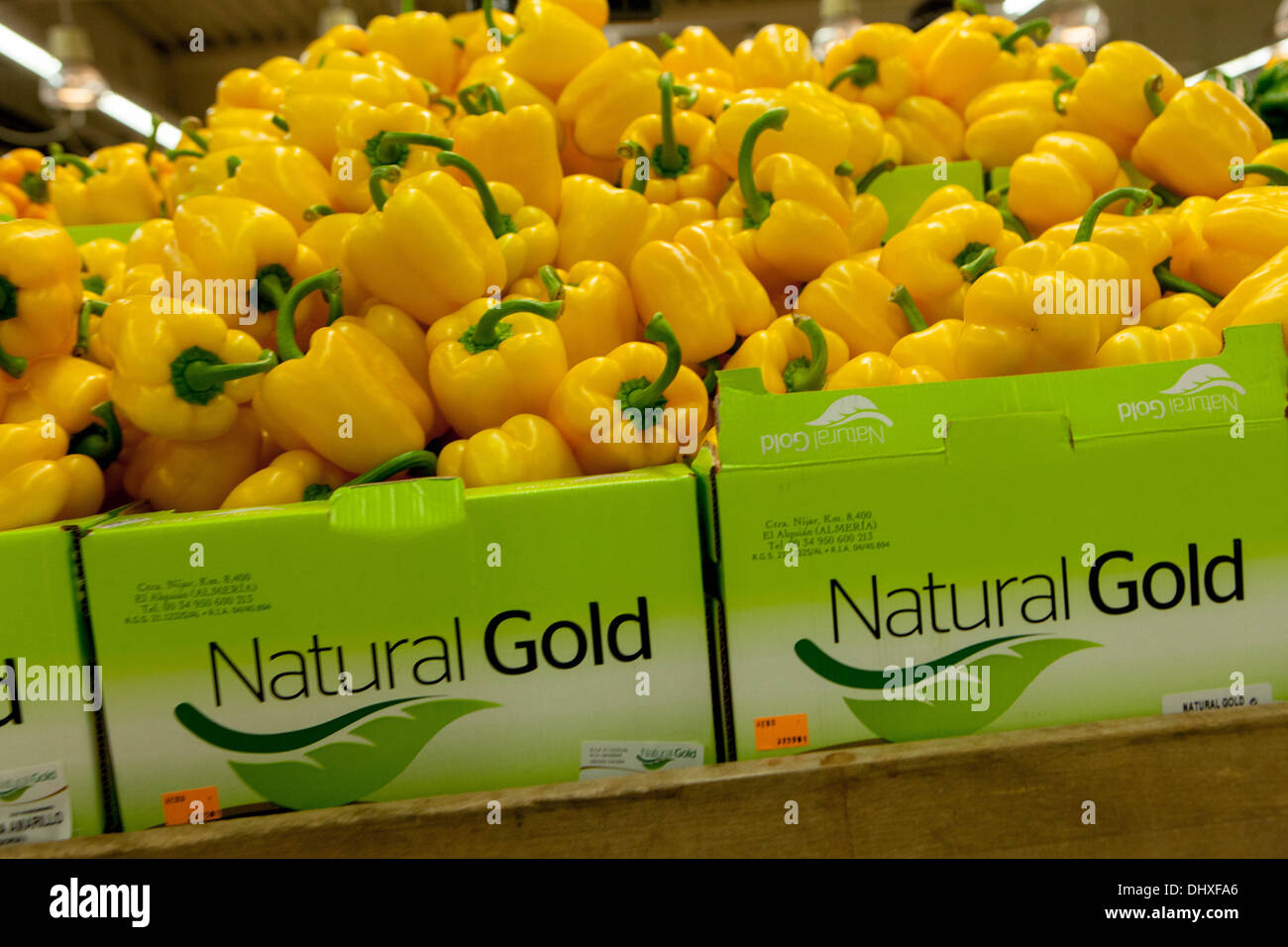 Lots of yellow bright paprika in a supermarket in Prague , Czech Republic Stock Photo