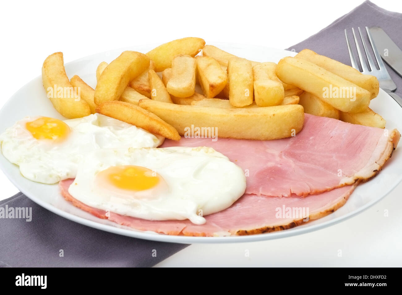 Dinner of sliced ham, fried egg and chips studio shot Stock Photo Alamy