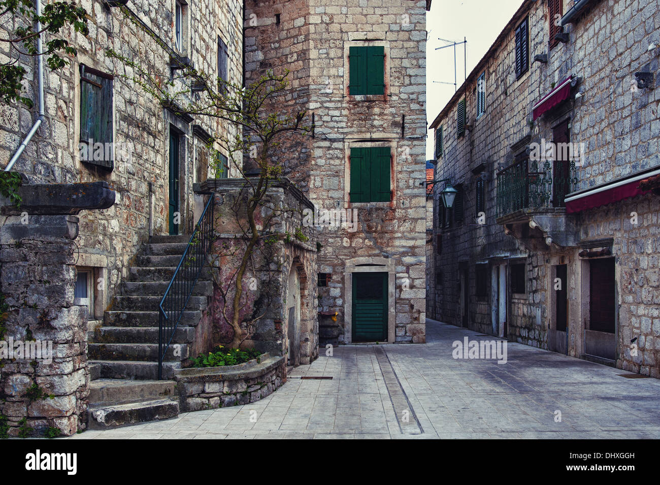 narrow alley with old houses in Stari Grad Stock Photo