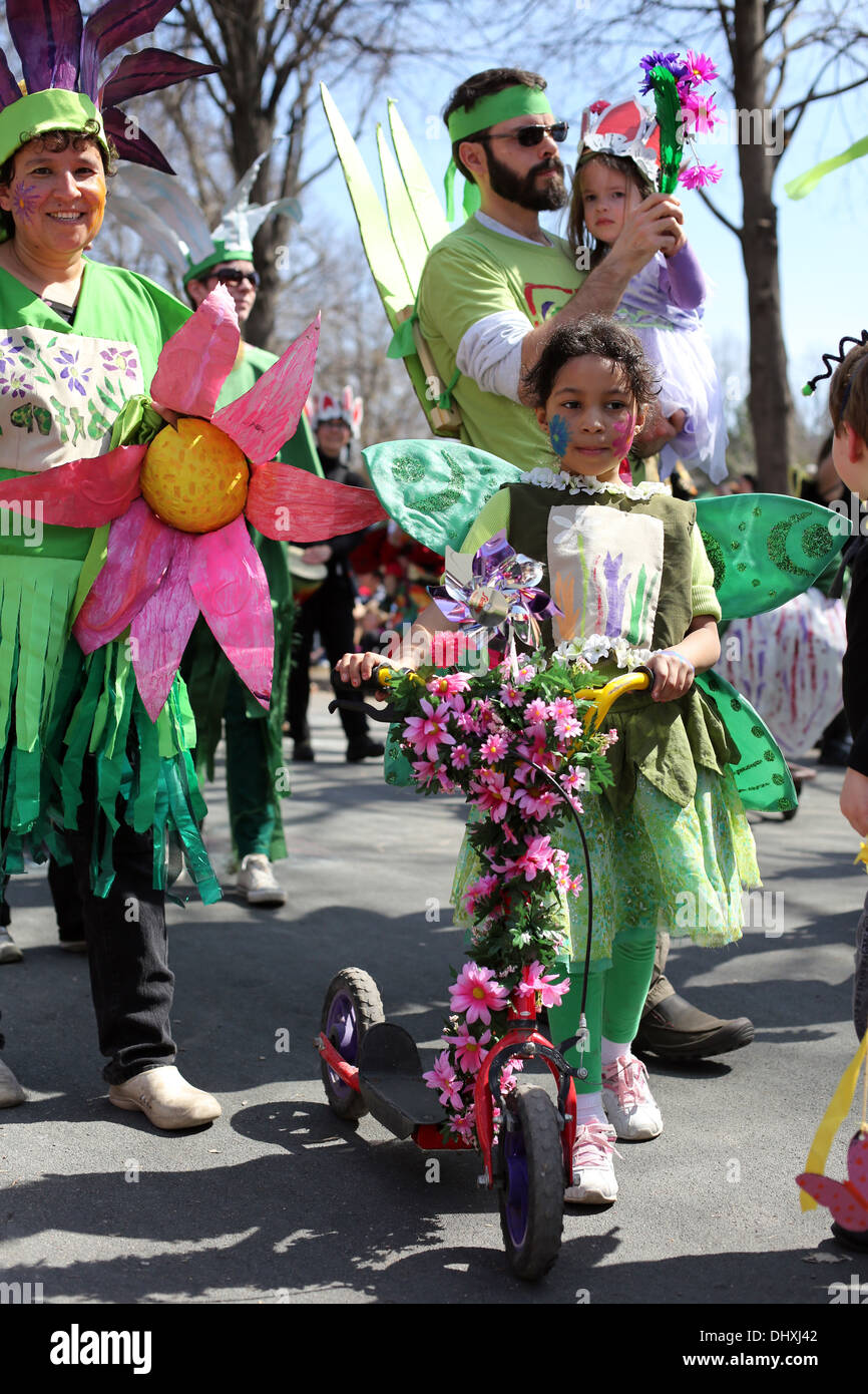 A young family dressed as flowers at the May Day parade in Minneapolis