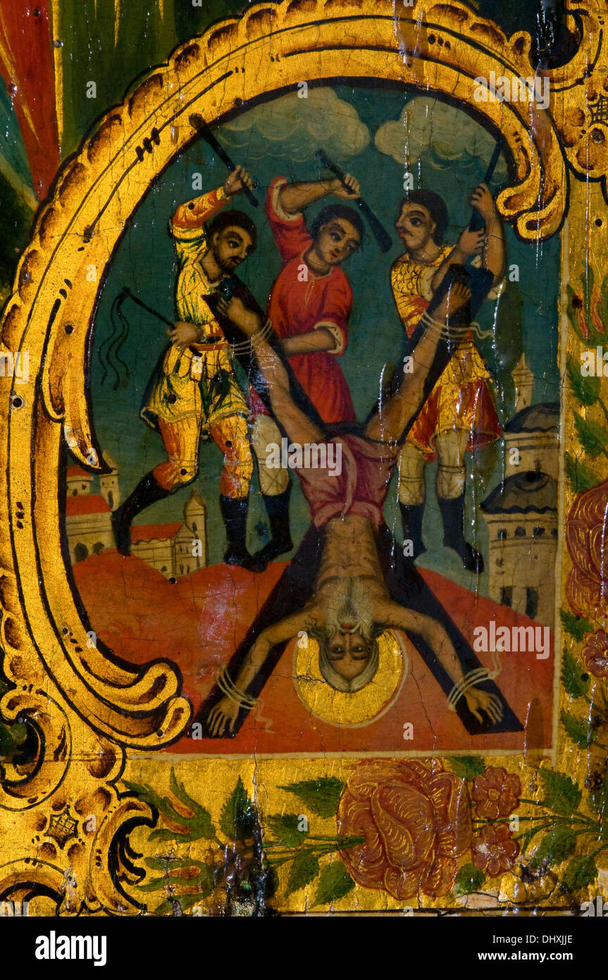 Small icon of Crucified Simon Peter the apostle found on a paneled wall in Sevlievo Orthodox Church in Bulgaria. Religious Art Stock Photo
