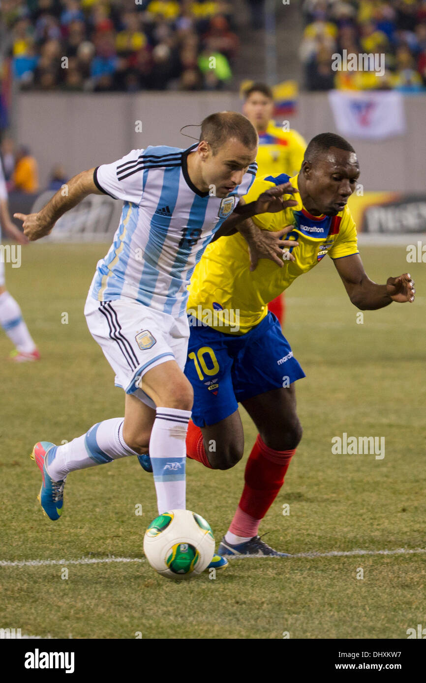 a tie, 0-0, . 15th Nov, 2013. Argentina forward Rodrigo Palacio (18) in action with the ball against Ecuador midfielder Walter Ayovi (10) during the Gillette International Soccer series game between Argentina and Ecuador at the MetLife Stadium in East Rutherford, New Jersey. The match ends in a tie, 0-0. (Christopher Szagola/Cal Sport Media) © csm/Alamy Live News Stock Photo