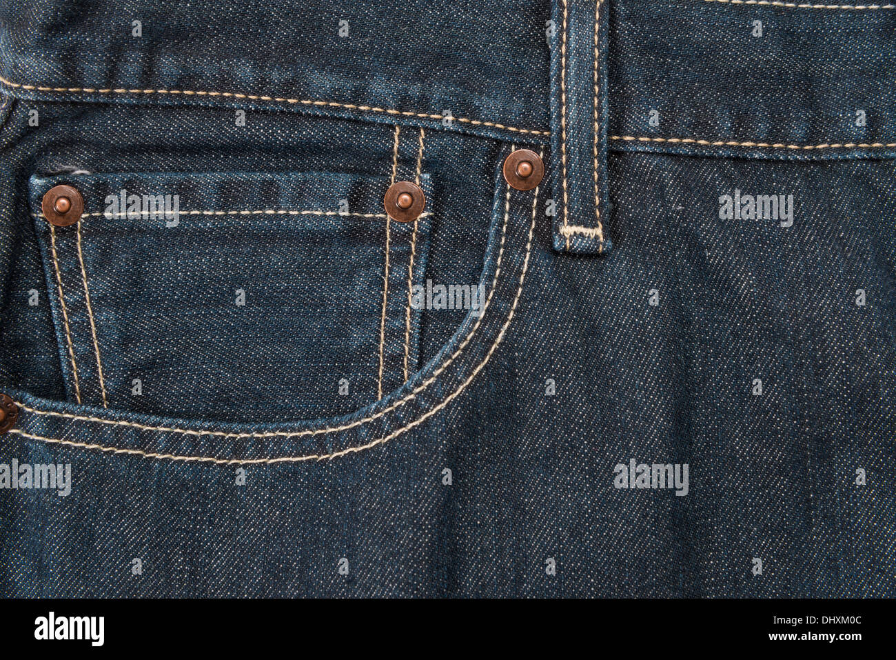 A pocket with rivets and a waistband used as a background Stock Photo