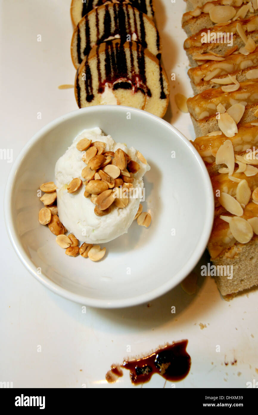Closeup Coconut ice cream in a white cup. Stock Photo