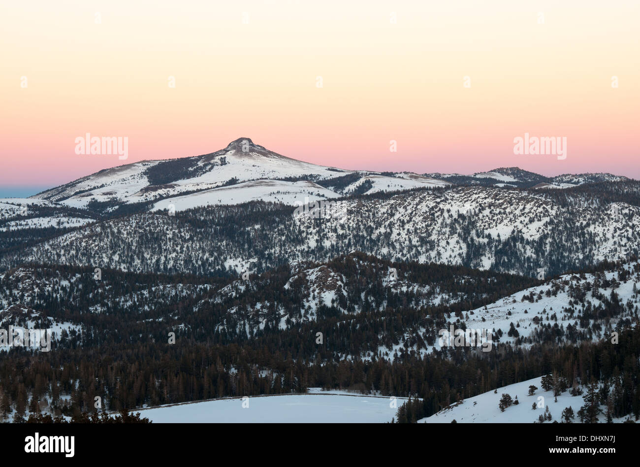 A view of the Stevens Peak against the background of golden sunset shot from highway 88, Lake Tahoe region, California, USA. Stock Photo