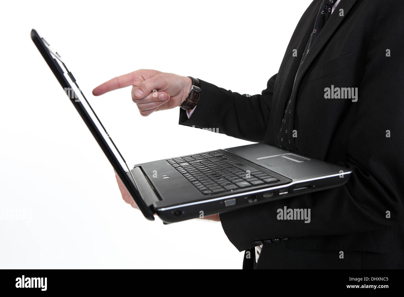 Man pointing at laptop screen Stock Photo