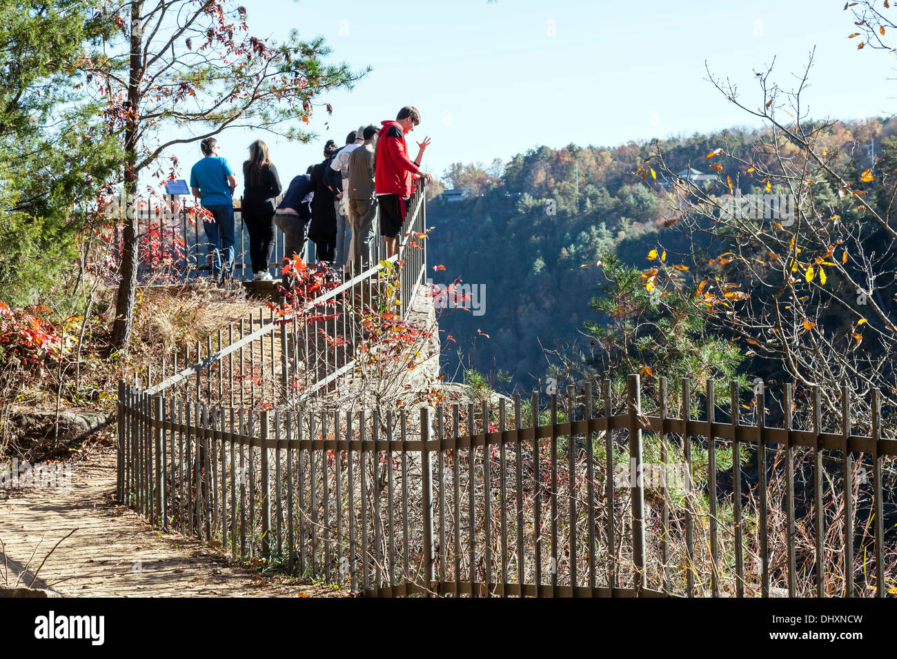 People line a railing at a scenic overlook in Tallulah Falls State Park in Rabun County, Georgia. USA Stock Photo