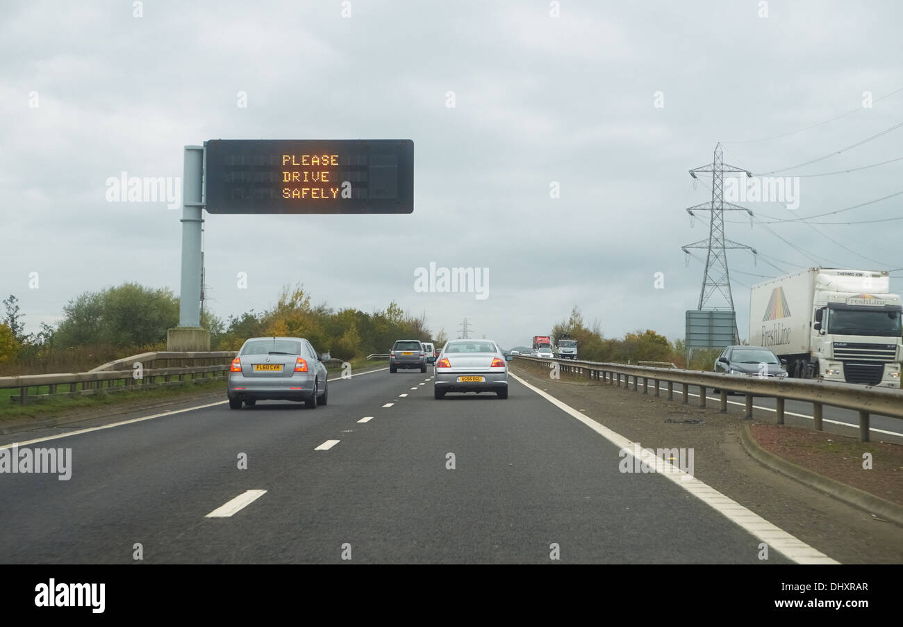 Please drive safely motorway sign, Scotland, UK. Stock Photo