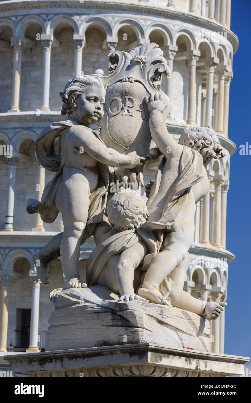 OPA statue at Piazza dei Miracoli with the leaning tower in Pisa, Italy