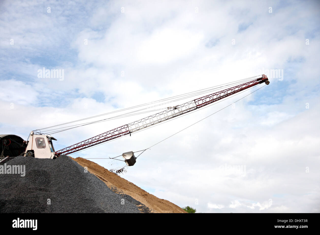 Wide angle view Machines scoop the soil. Stock Photo