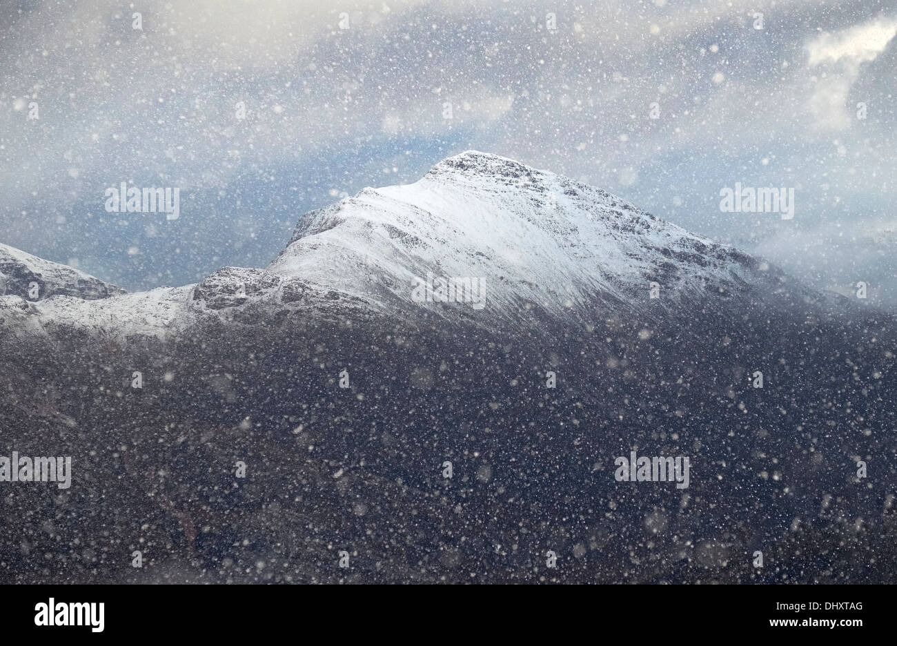 The summit of Sgorr Ruadh near Torridon during a white out snow storm in the Scottish Highlands, UK. Stock Photo