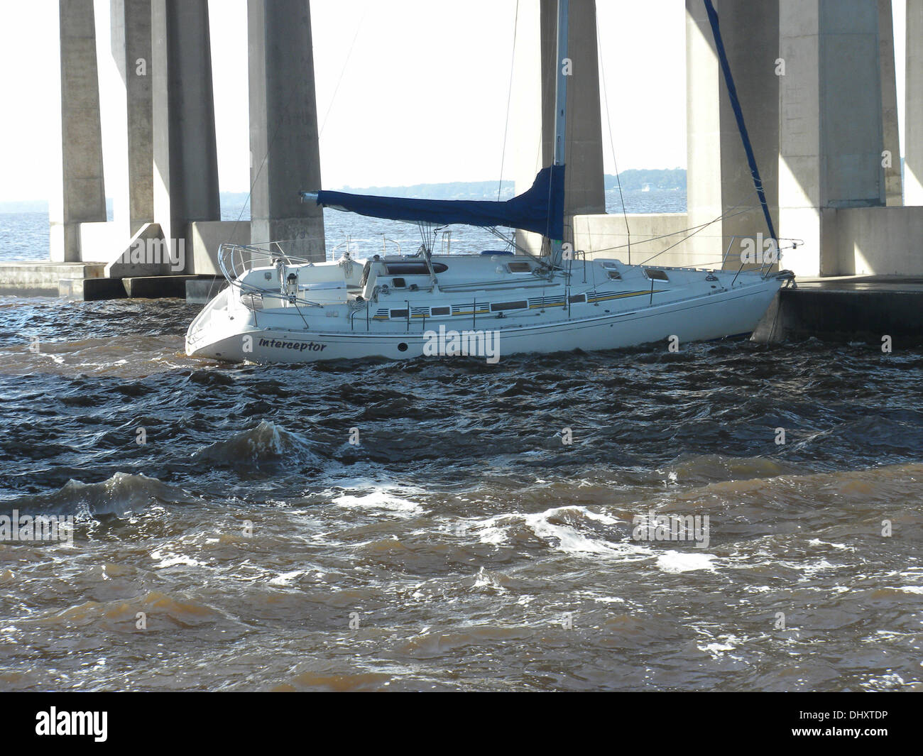 The Coast Guard is responding after receiving reports that a 38-foot sailboat struck the Buckman Bridge in Jacksonville, Fla., Thursday, Nov. 14, 2013. The sailboat, named Interceptor, broke free from its mooring at Mulberry Cove Marina in Jacksonville be Stock Photo