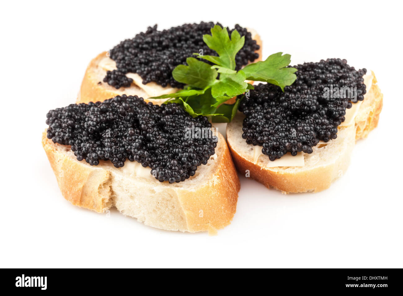 Sandwiches with black caviar isolated on white background Stock Photo