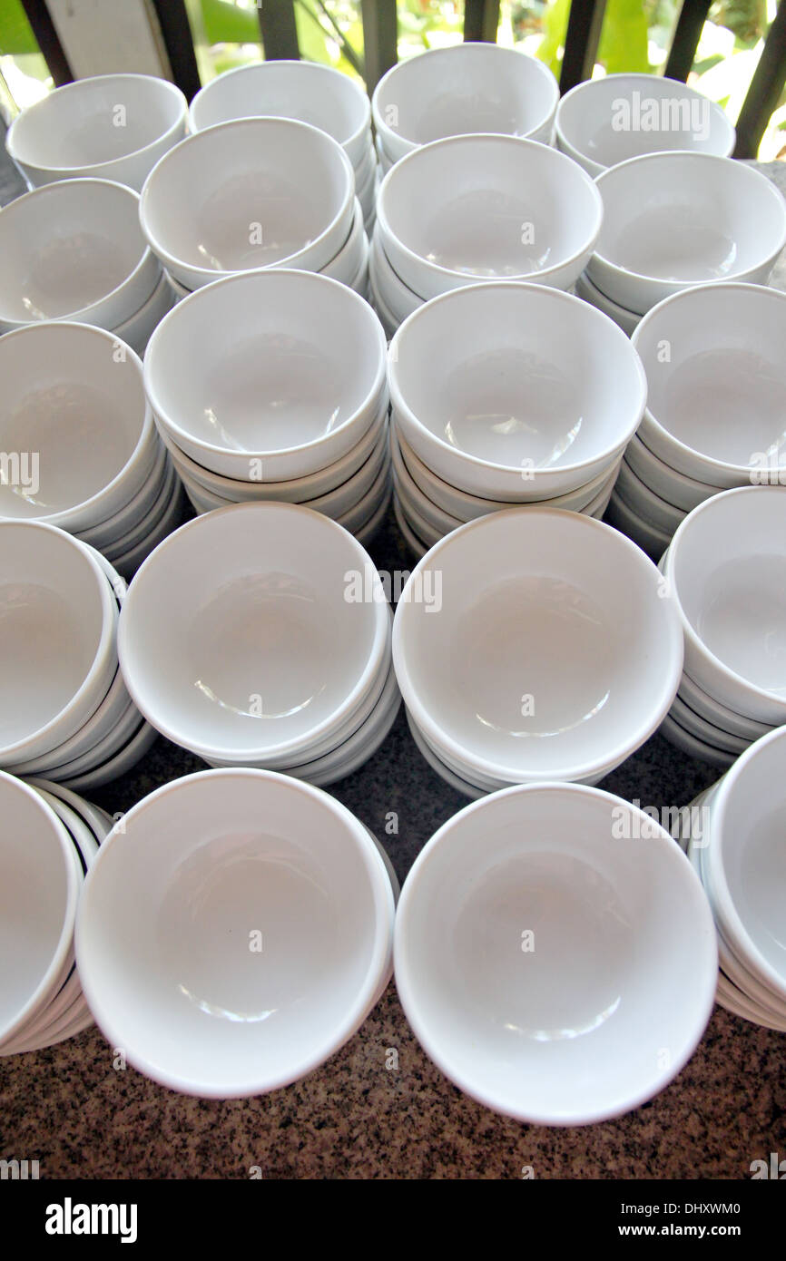 a lot of white cups on the table. Stock Photo