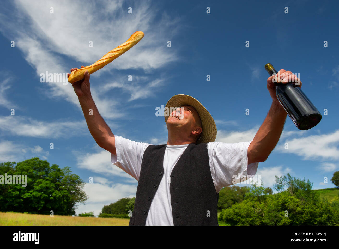 Typical French man with bread and wine Stock Photo Alamy