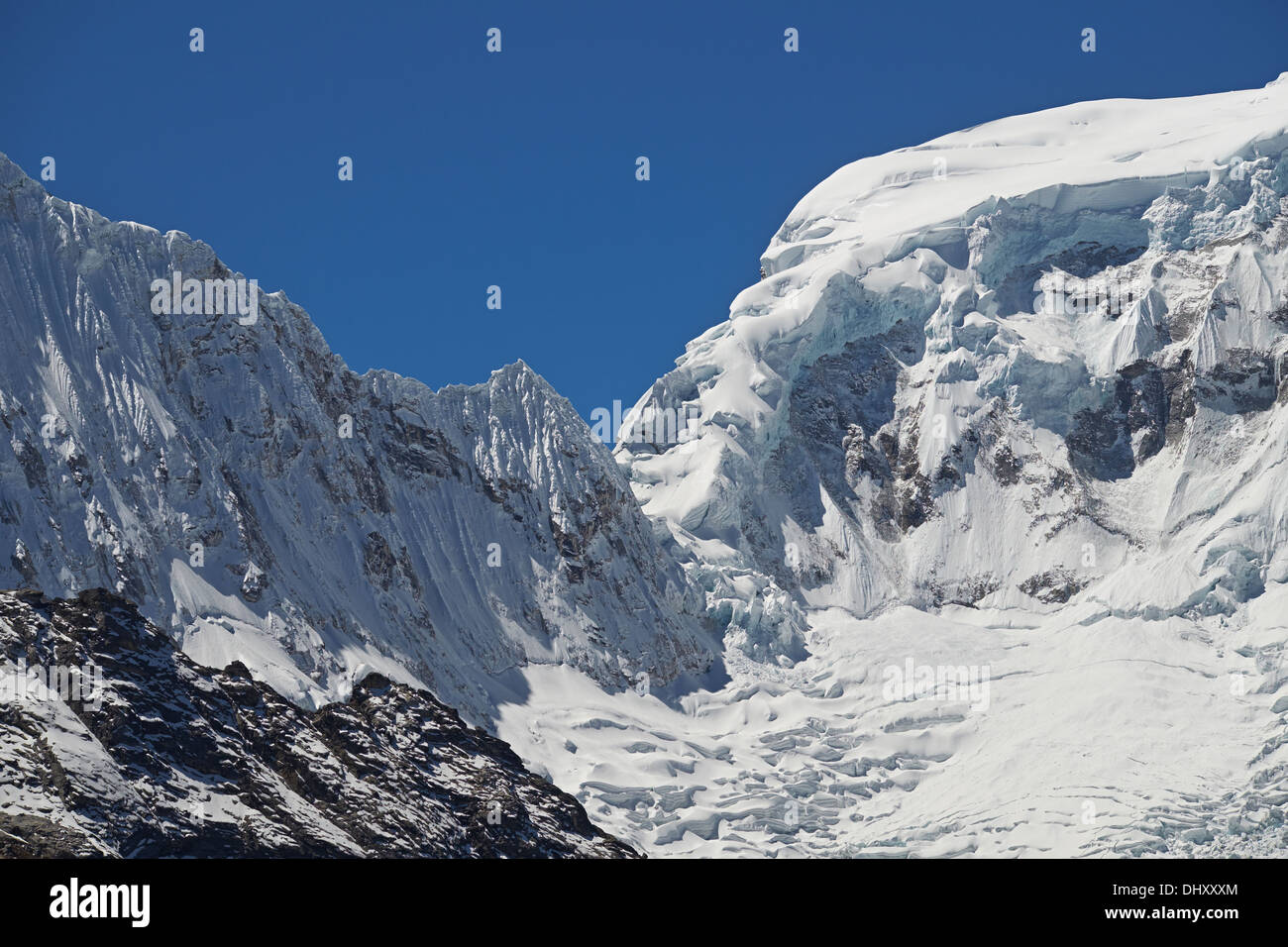 Ranrapalca Summit (6162m) & Ocshapalca (5888m) in the Peruvian Andes. Stock Photo
