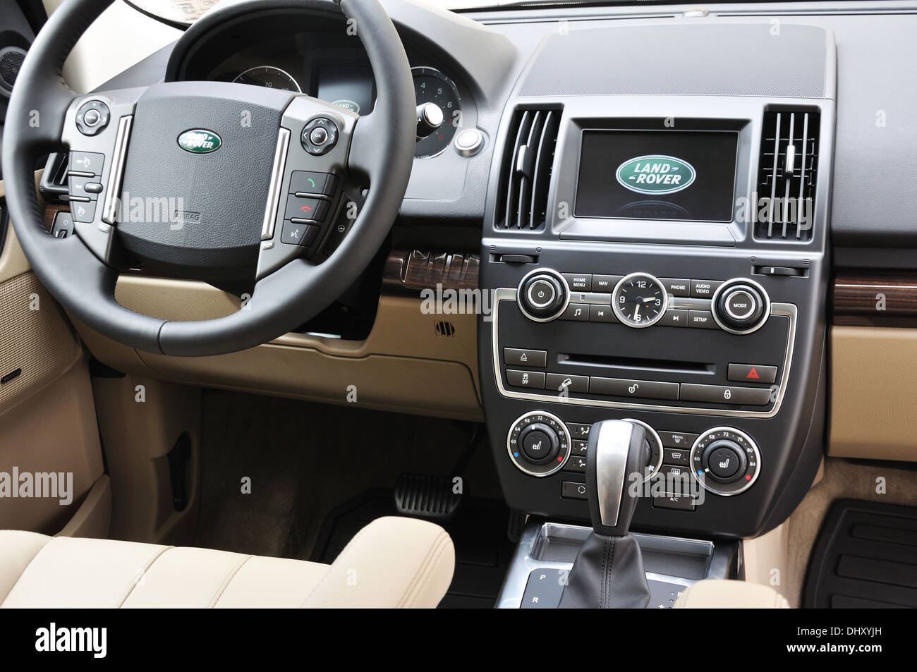 LandRover steering wheel and control panel Stock Photo - Alamy
