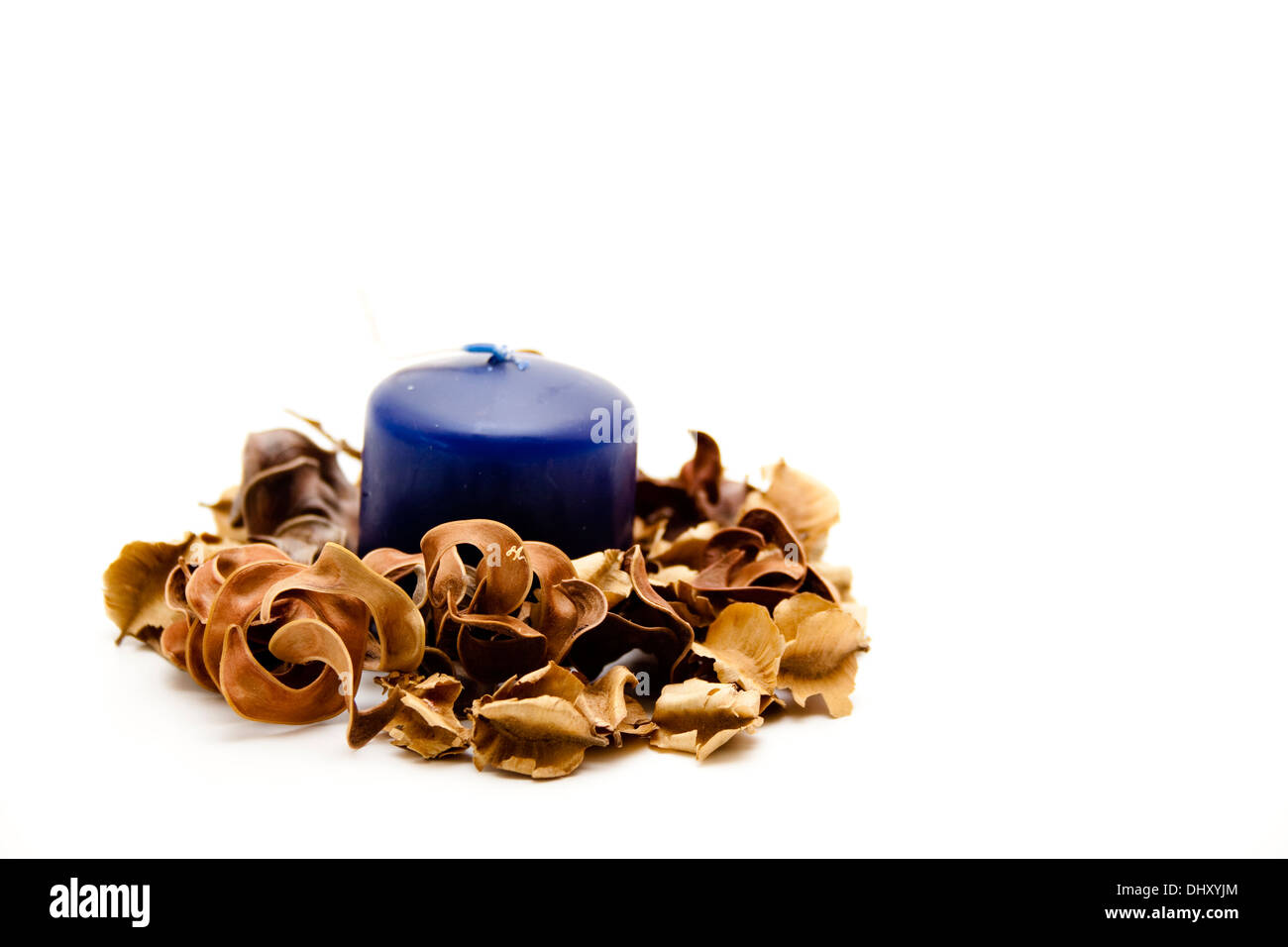 Blue candle with potpourri Stock Photo Alamy