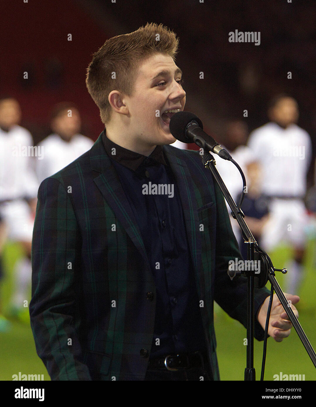 Glasgow, Scotland. 15th Nov, 2013. X Factors Nicholas McDonald sings Flower of Scotland in the International friendly fixture between Scotland and the USA. From Hampden Stadium, Glasgow. Credit:  Action Plus Sports/Alamy Live News Stock Photo