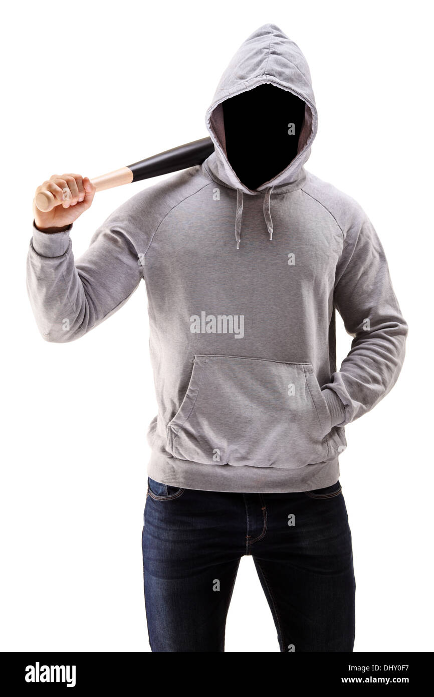 Man in a hoodie holding a baseball bat symbolizing crime Stock Photo