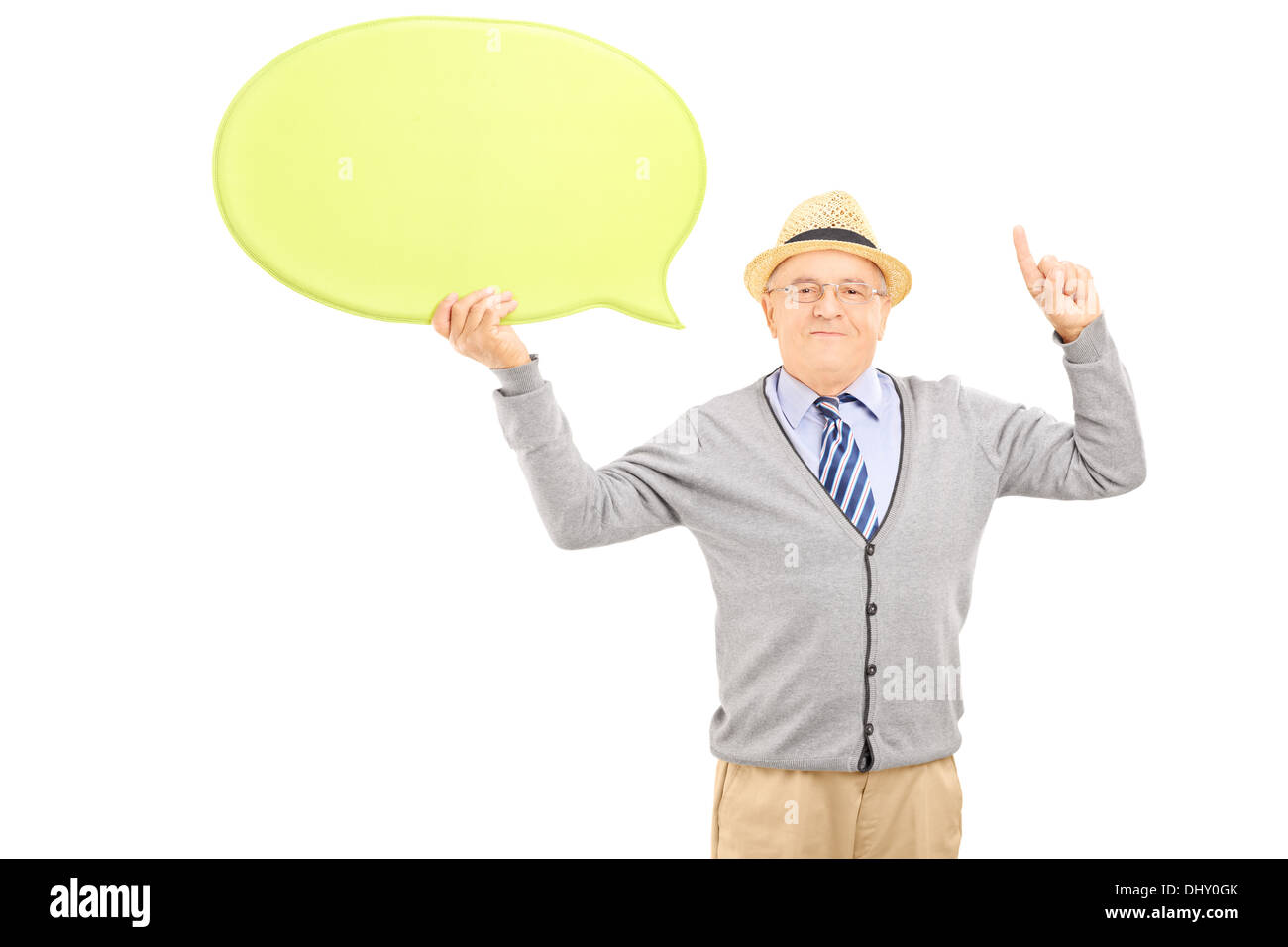 Senior gentleman holding an empty speech bubble and gesturing with his finger Stock Photo