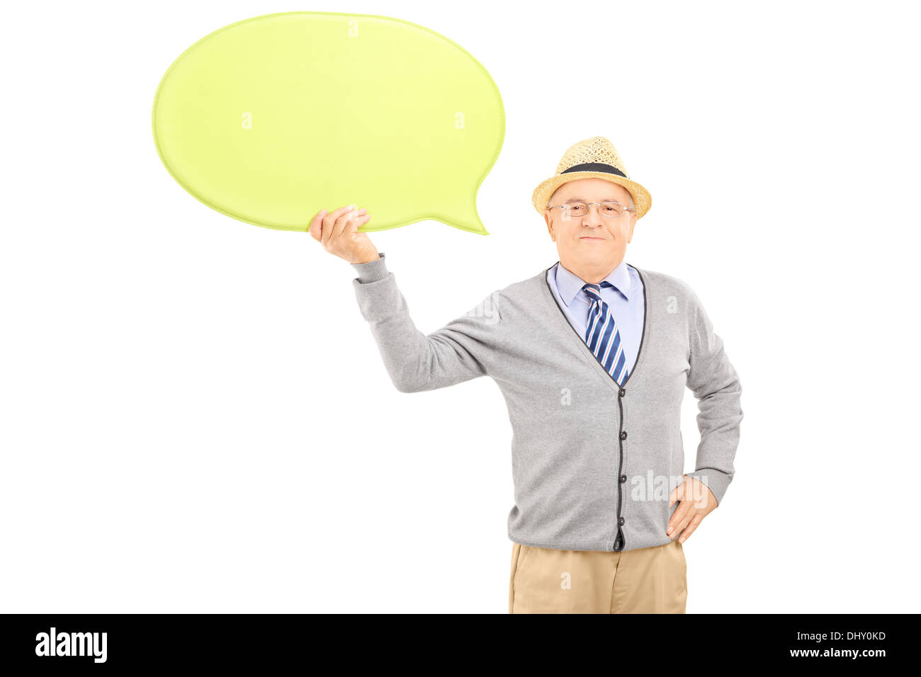Senior smiling gentleman holding an empty speech bubble and looking at camera Stock Photo