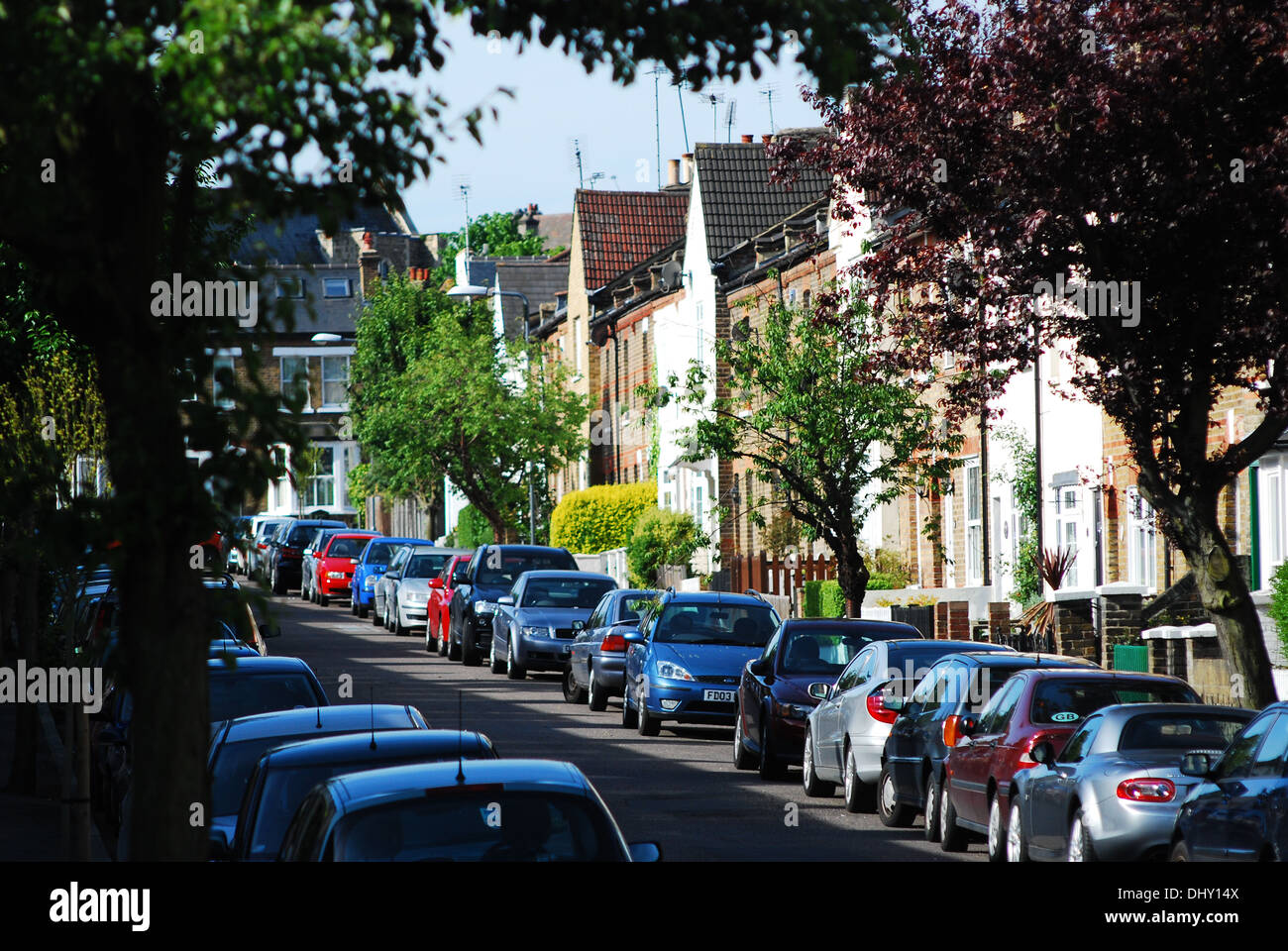 Houses in tree lined Cowley Road, Wanstead, London E11, one of London's property hot spots. Stock Photo