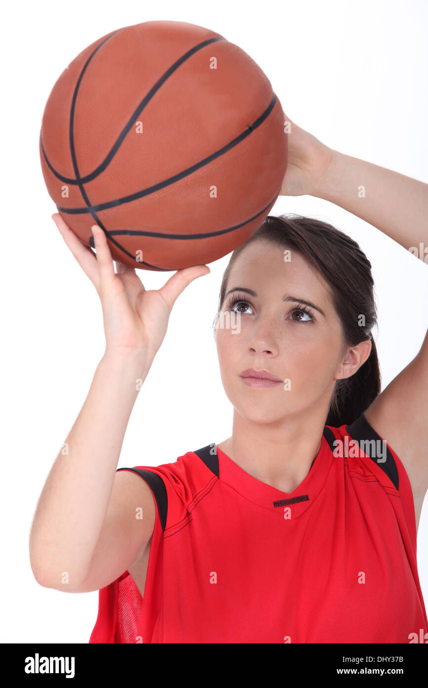 Girl throwing basketball Stock Photo Alamy