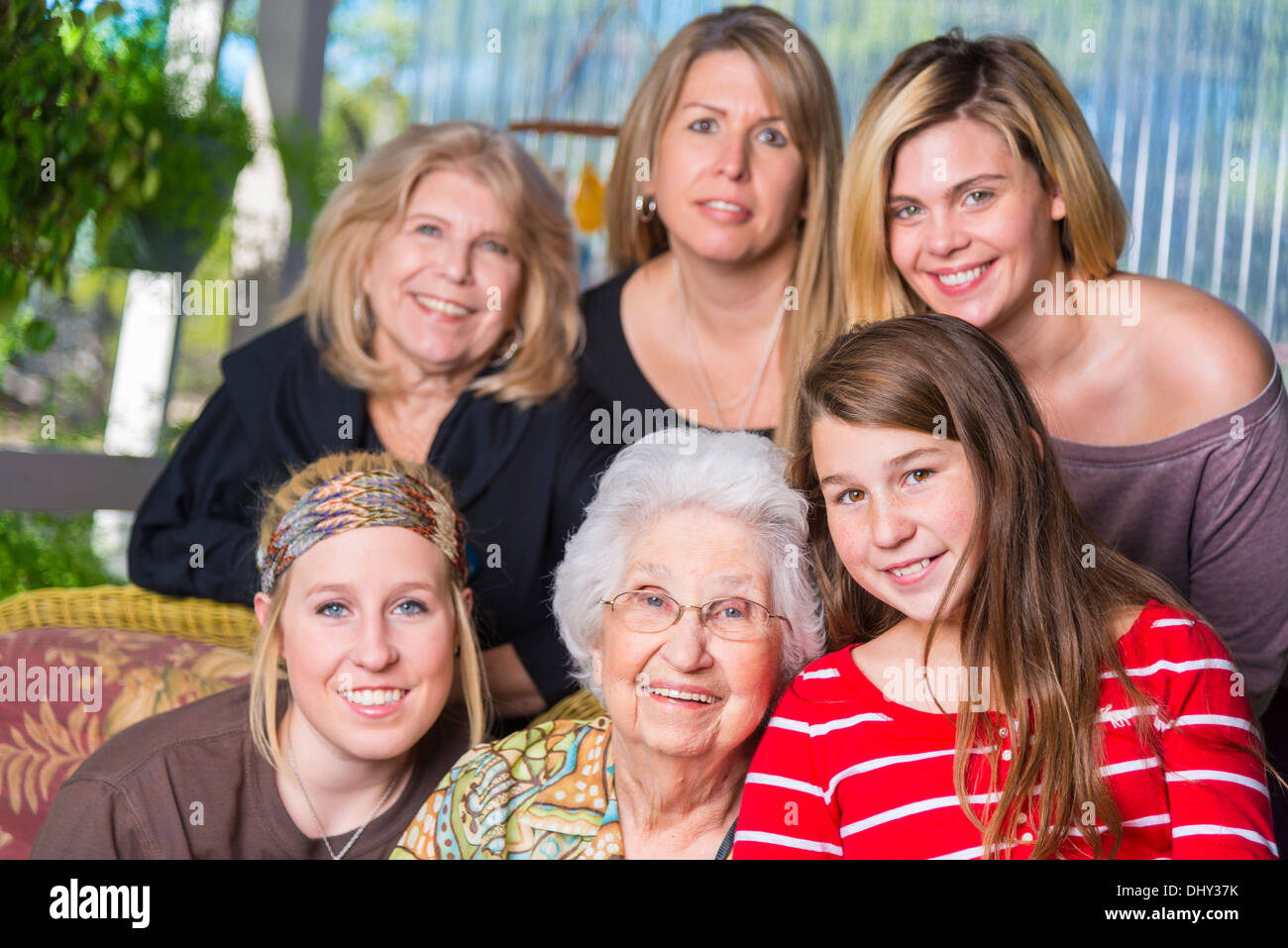 Family portrait of six women at ages from 11 to 93 years old Stock Photo