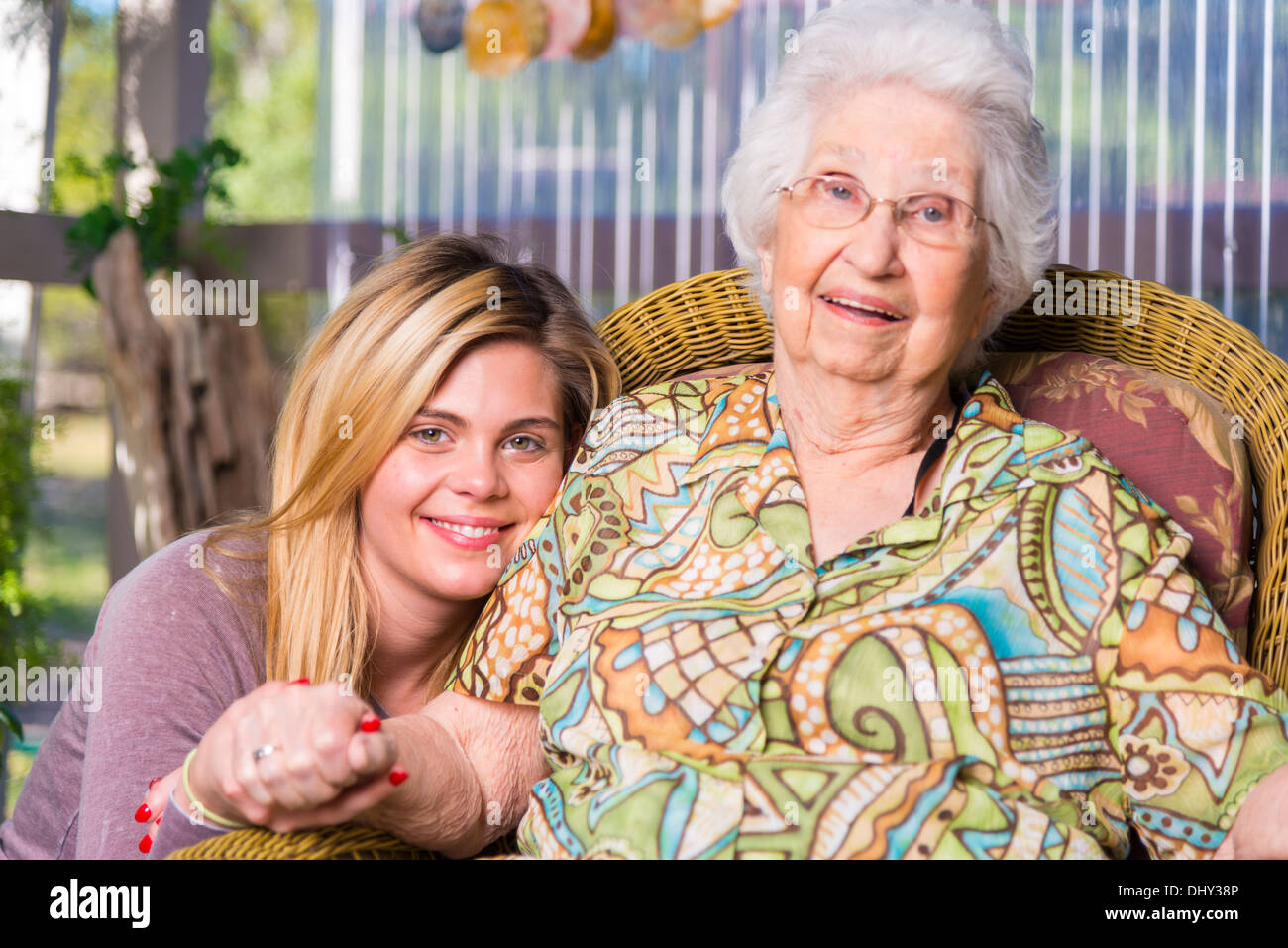 Portrait of great grandmother in her nineties with young attractive woman of 24 years. Caucasian ethnicity. Stock Photo