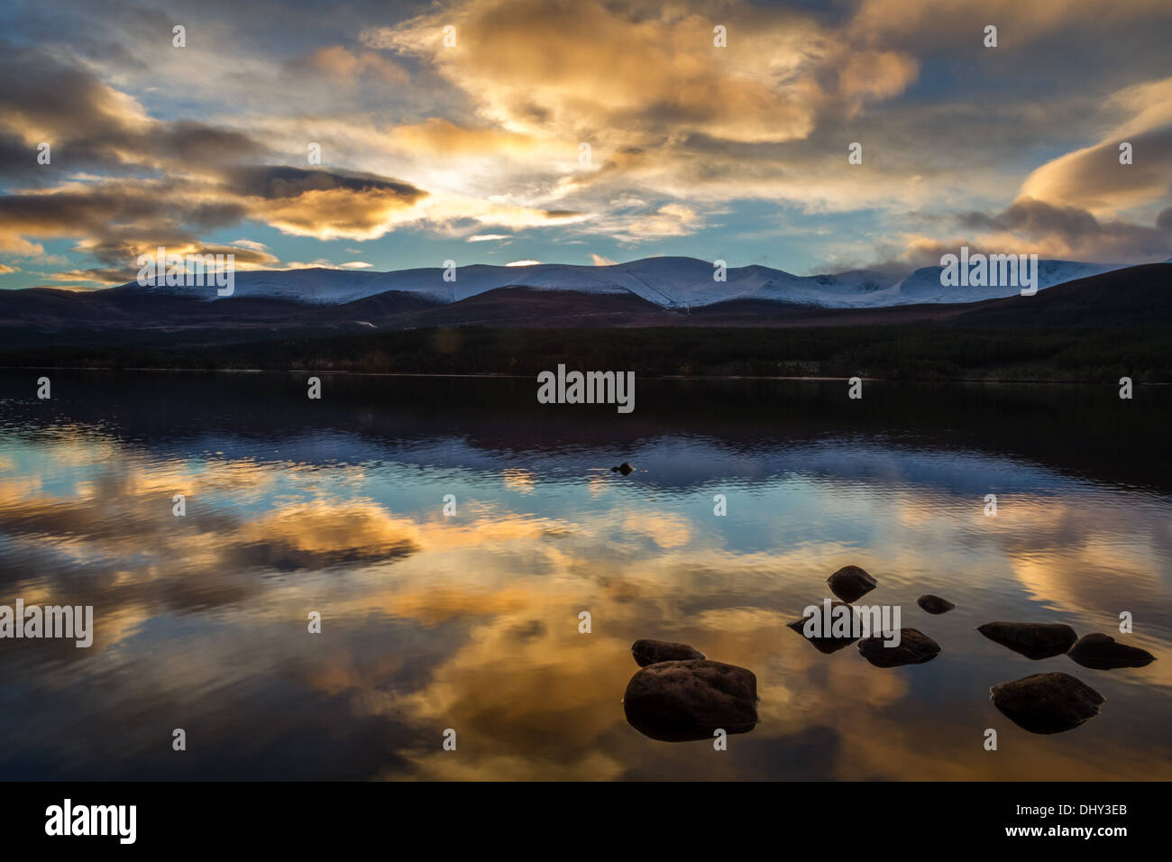 morning reflection on Loch Morlich in the Cairngorms Stock Photo