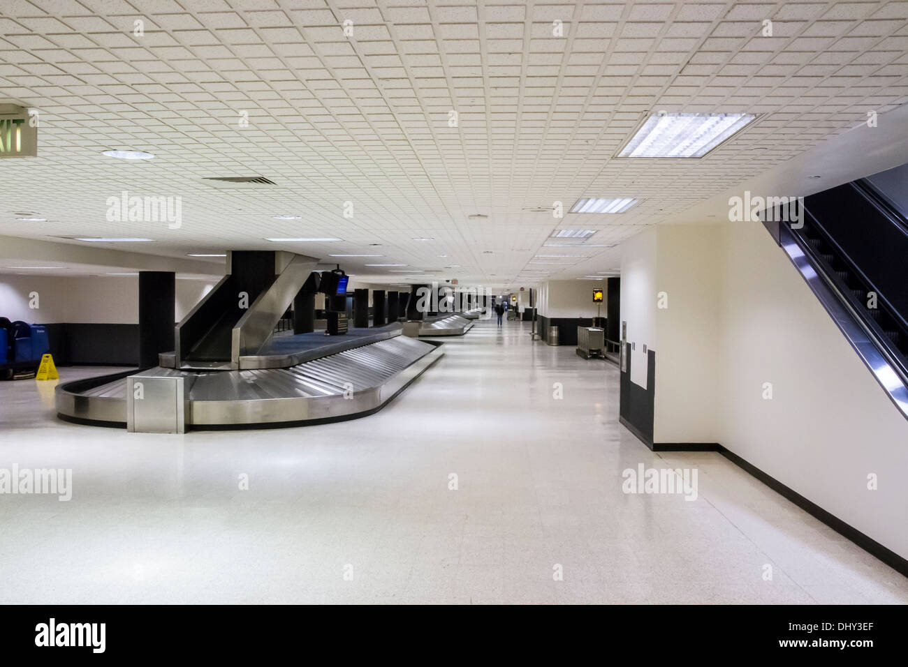A nearly deserted LAX terminal 2 baggage claim area Los Angeles International Airport at Midnight Stock Photo