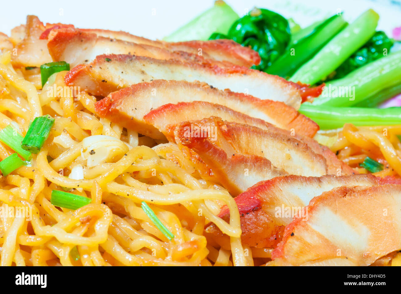 Chinese egg noodles with red pork Stock Photo Alamy