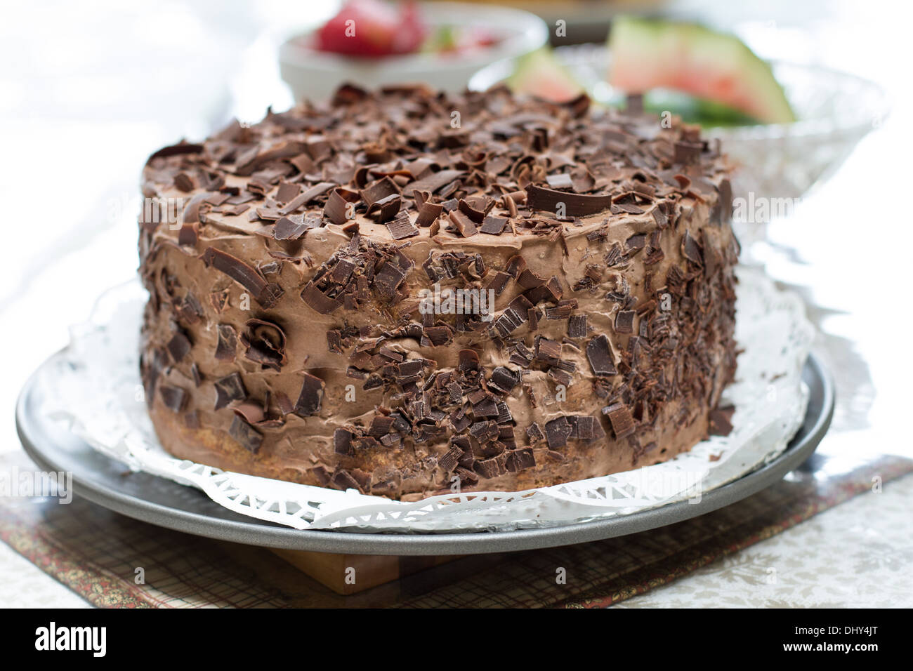 Delicious German Chocolate Cake served with fresh fruit Stock Photo