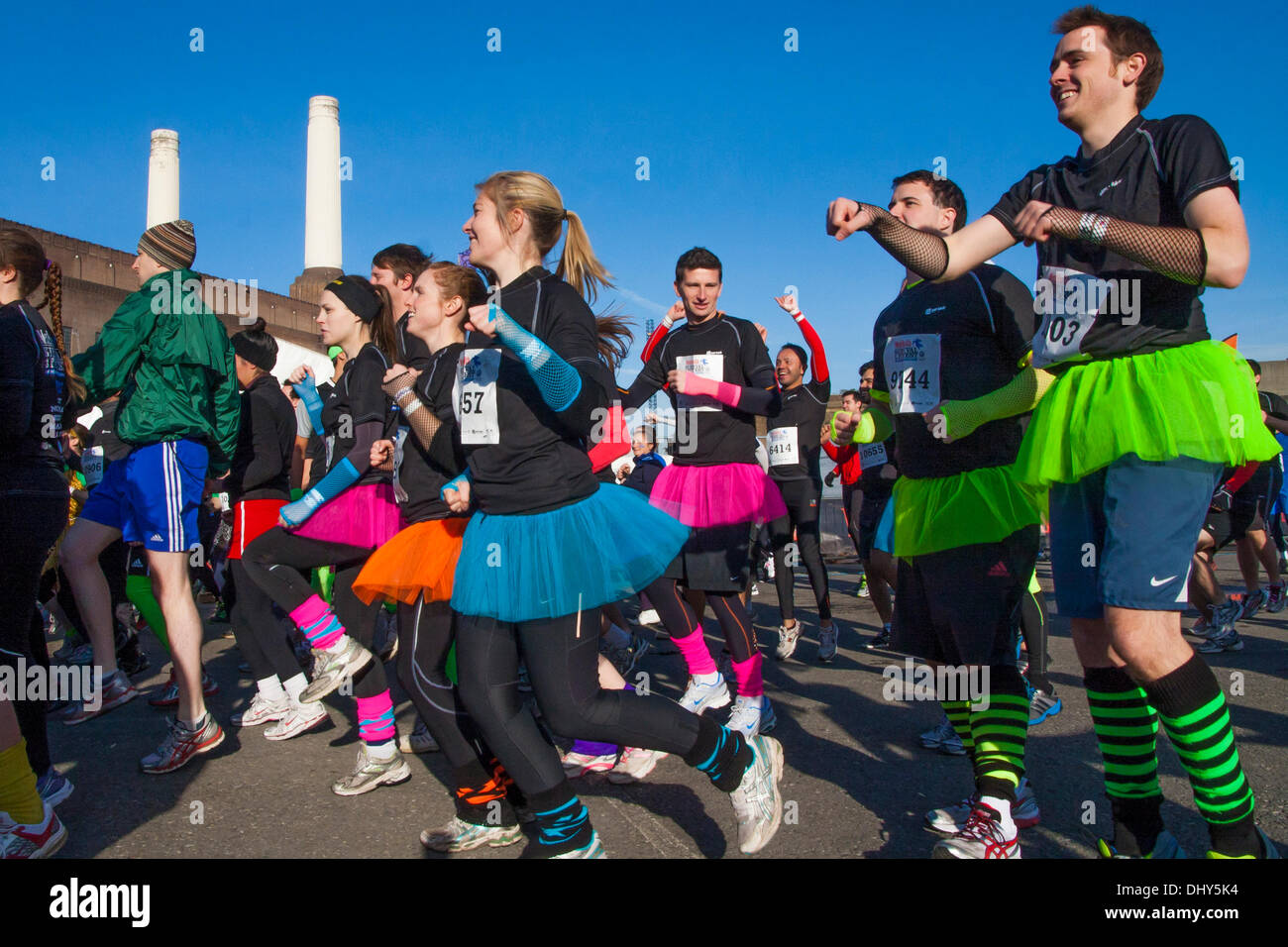 Battersea, London, UK. 16th November 2013. Some teams dressed up for the occasion at the Men's Health Survival of the Fittest 2013 event at Battersea Power Station. Credit:  Paul Davey/Alamy Live News Stock Photo