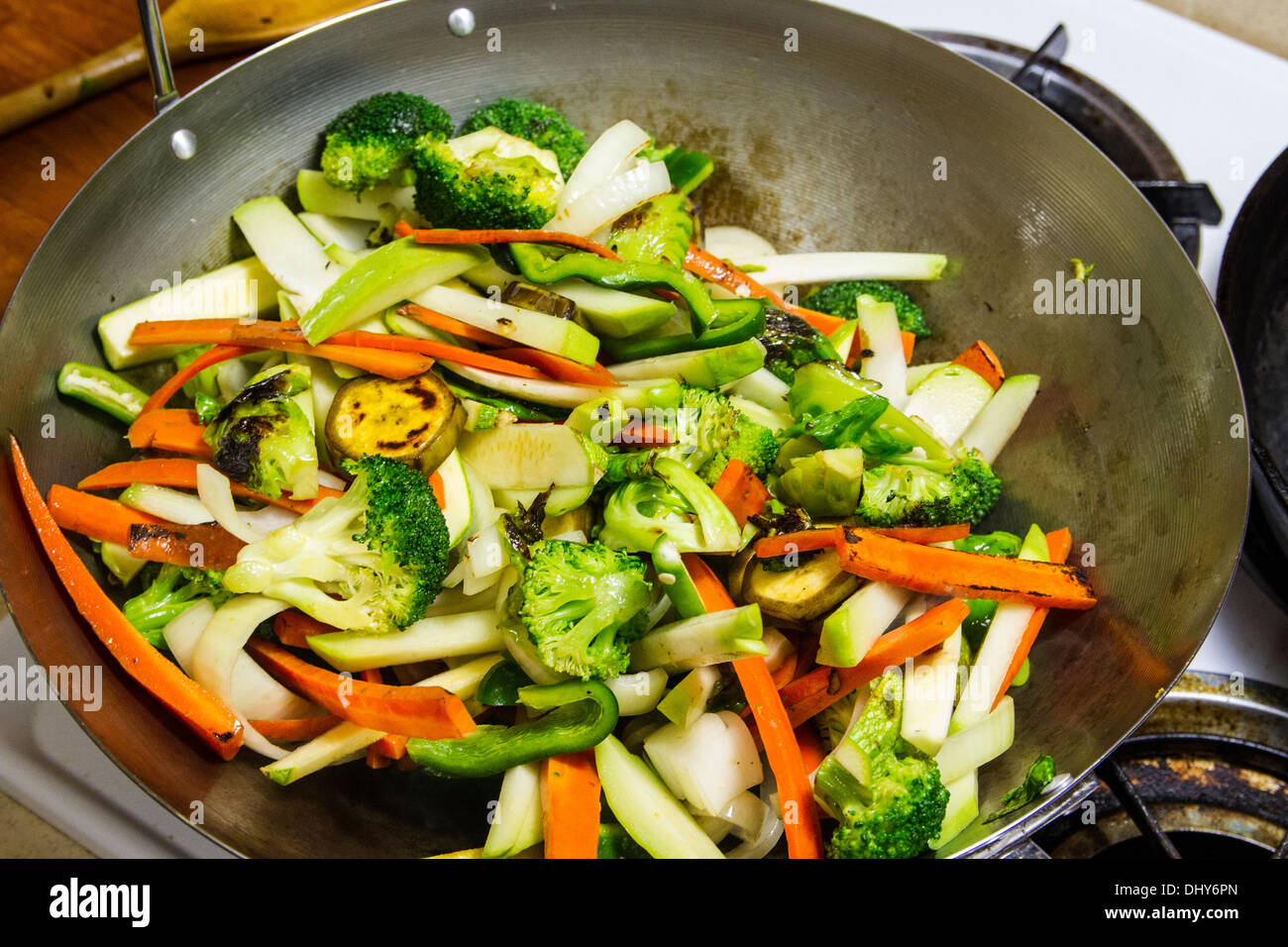 Broccoli sliced carrots Chayote Squash Plantain Brussel Sprouts in a
