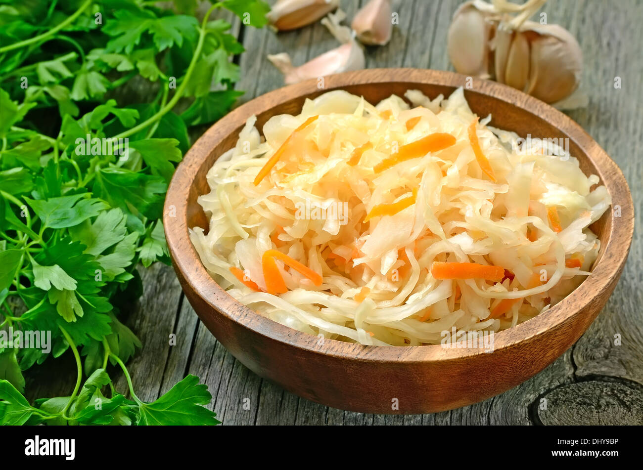 Sauerkraut in the wooden bowl Stock Photo