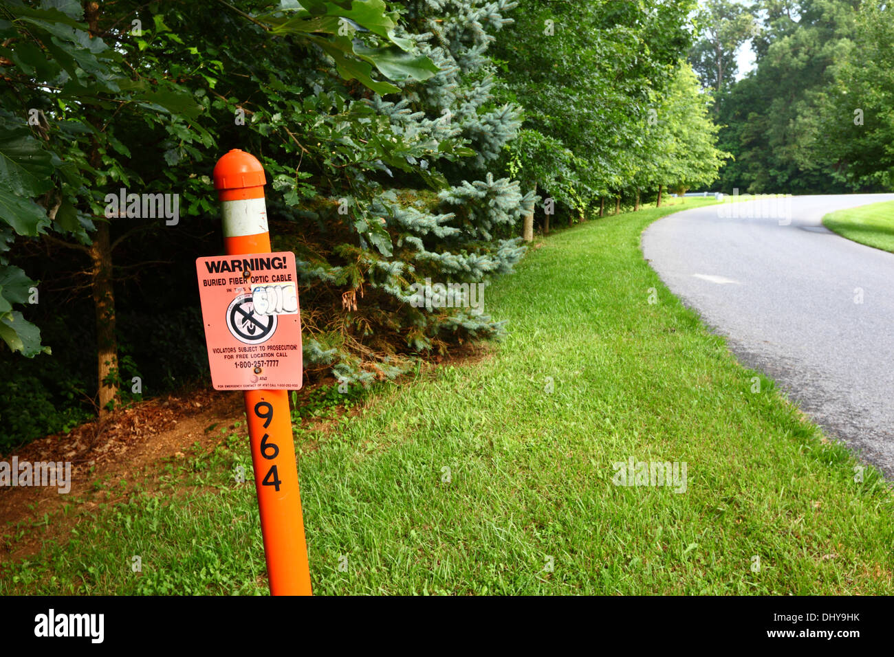 Sign showing position of underground fiber optic cable , Westminster , Carroll County, Maryland , USA Stock Photo