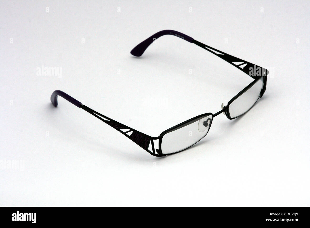 A pair of reading glasses isolated on a white background. Stock Photo